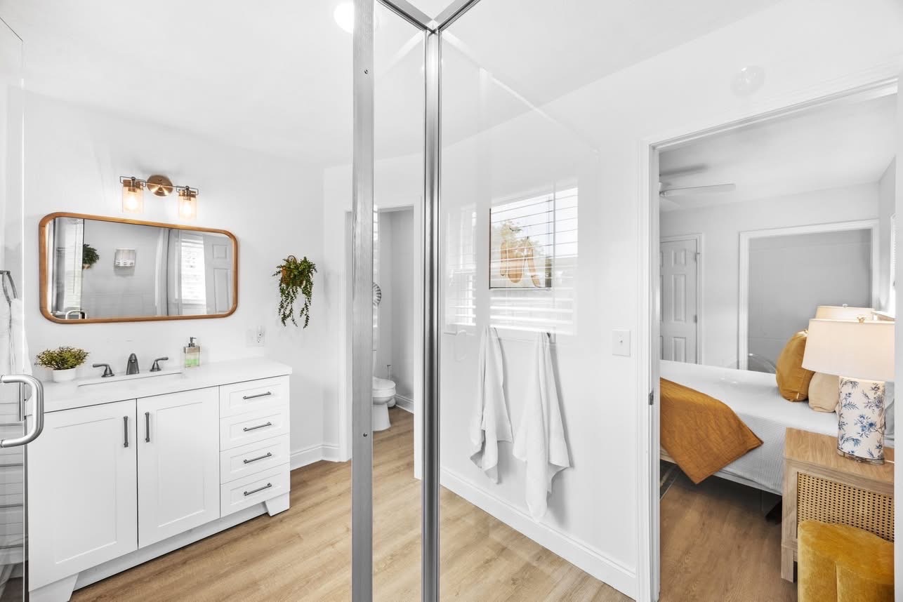 White bathroom with glass shower