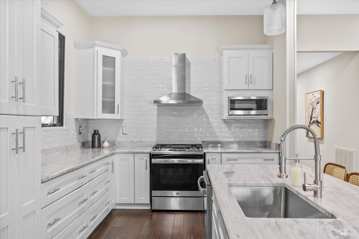 White kitchen with gas range