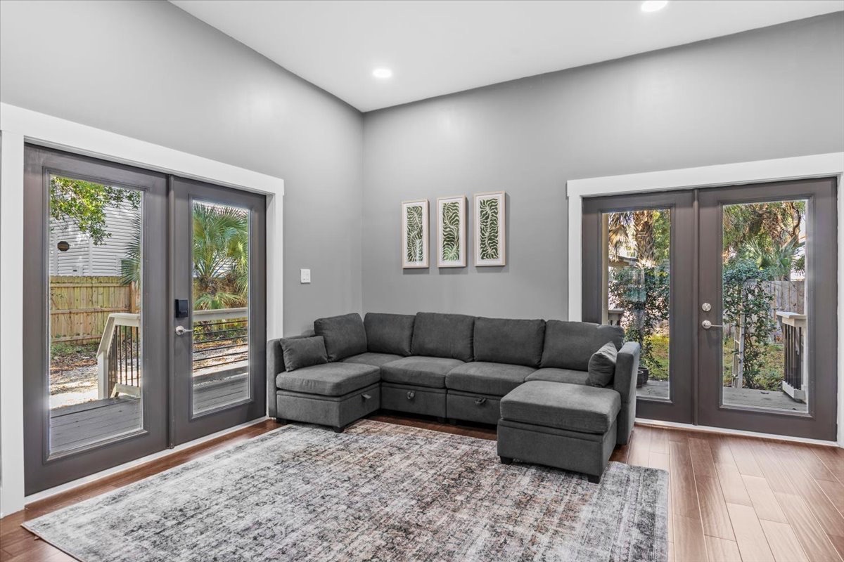 Gray sectional living room with French doors
